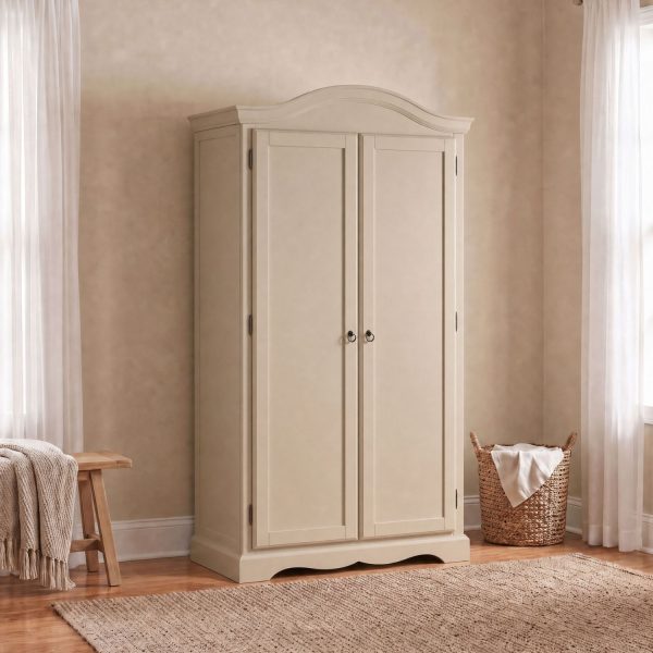 Romance beige double wardrobe featuring two tall panelled doors, a curved top cornice, a sweetheart base, and routed cabinet details.